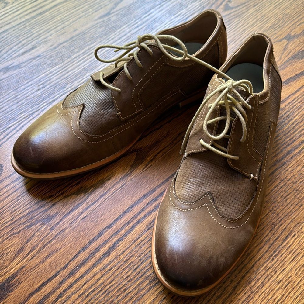 Steve Madden CRYSP leather burnished brown woven accent wingtip lace up shoes.